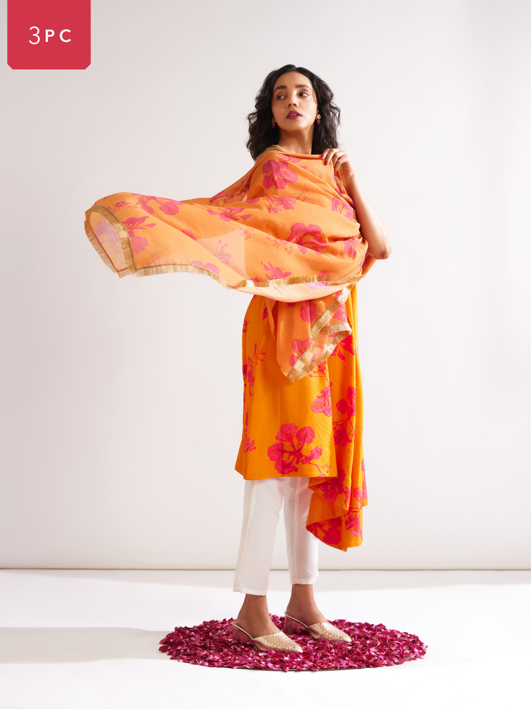 Asymmetrical Gulmohar kurta with cut out sleeves paired with pegged pants along with dupatta- Spicy orange