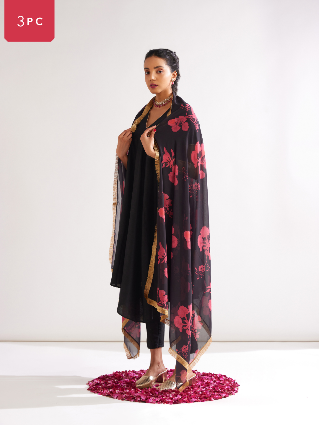 Gulmohar Petal kurta highlighted with gota patti paired with pegged pants along with dupatta- Rich black