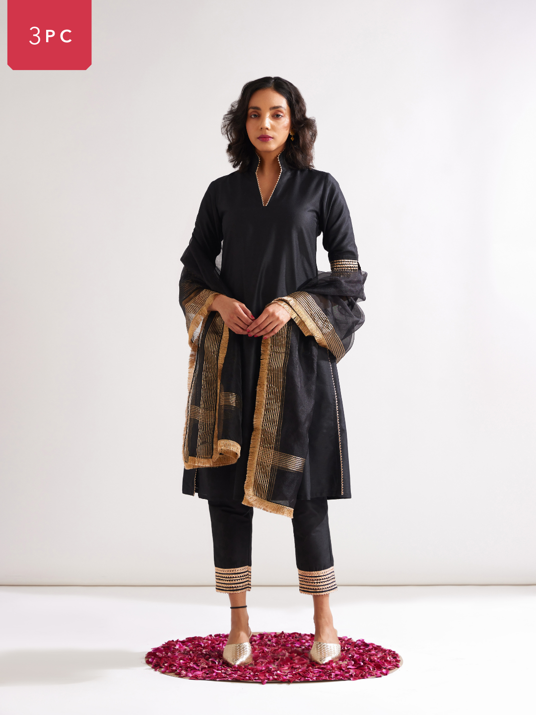 Stand collar straight kurta highlighted with gota patti with pegged pants along with dupatta- Rich black