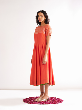 Circular panelled dress highlighted with Gota patti yoke- Spicy Orange