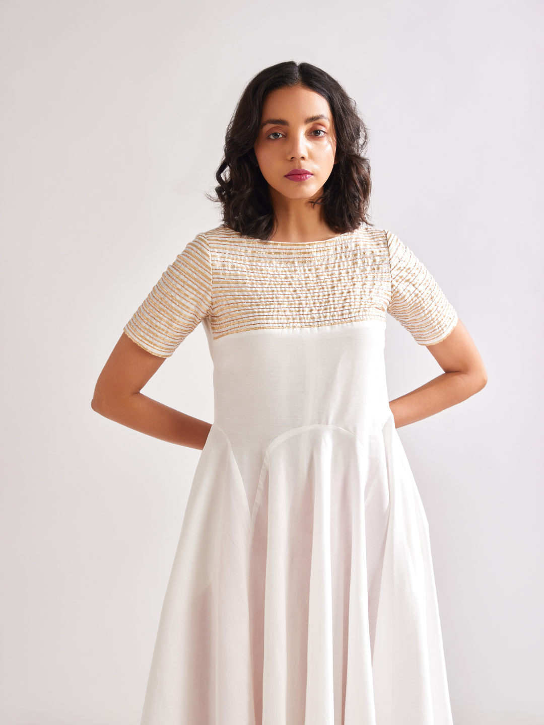 Circular panelled dress highlighted with Gota patti yoke- Ivory