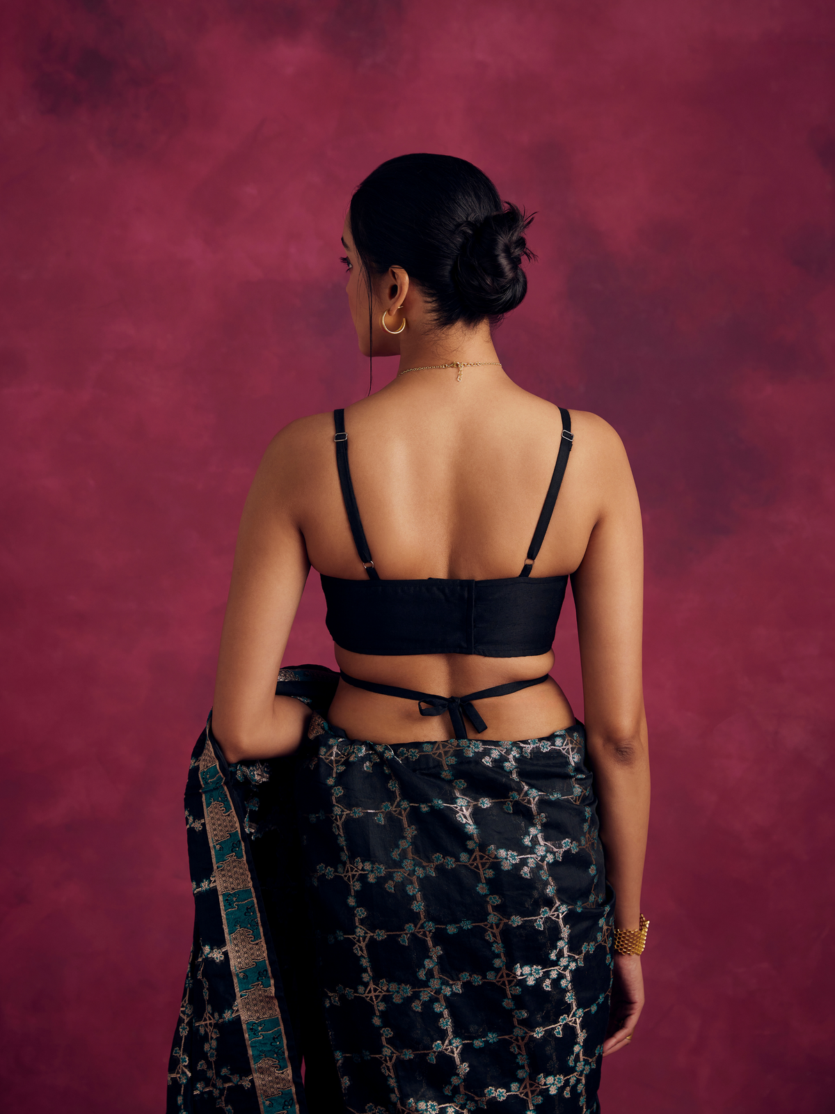 Demi- shaped blouse with
criss cross tie up- Rich black