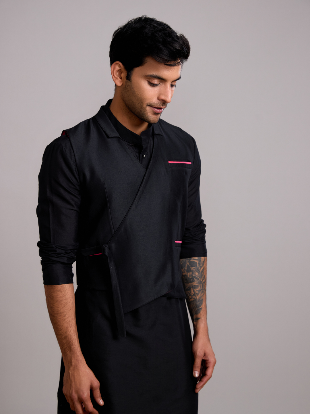 Gulmohar overlapped jacket with mandarin collar straight kurta paired with Straight pants- Rich black