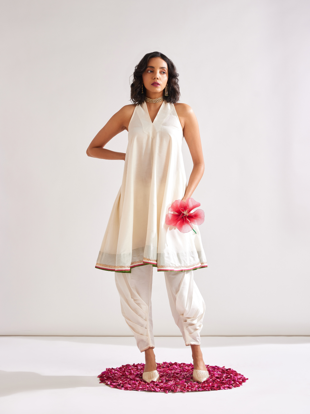 Back overlap halter neck kurta paired with side pleated pants along with dupatta- Ivory