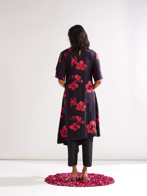 Asymmetrical Gulmohar kurta with cut out sleeves paired with pegged pants along with dupatta- Rich black