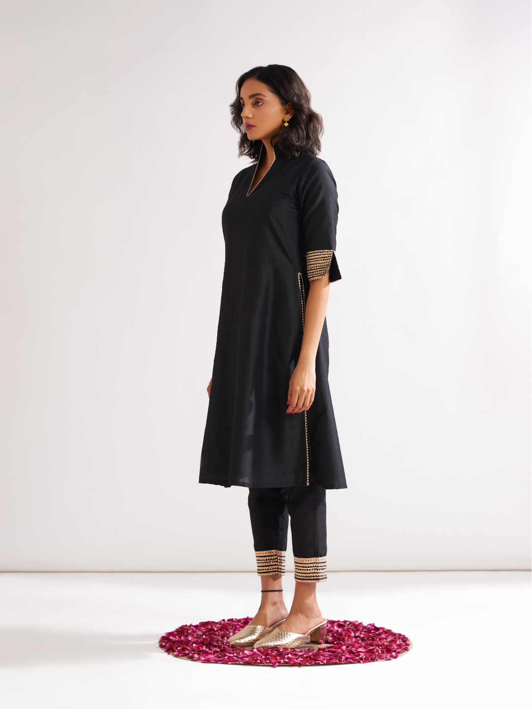 Stand collar straight kurta highlighted with gota patti with pegged pants- Rich black