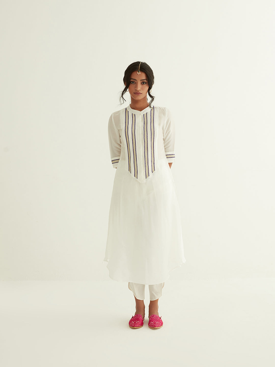 Straight banarasi kurta with a highlighted long placket with tulip pants