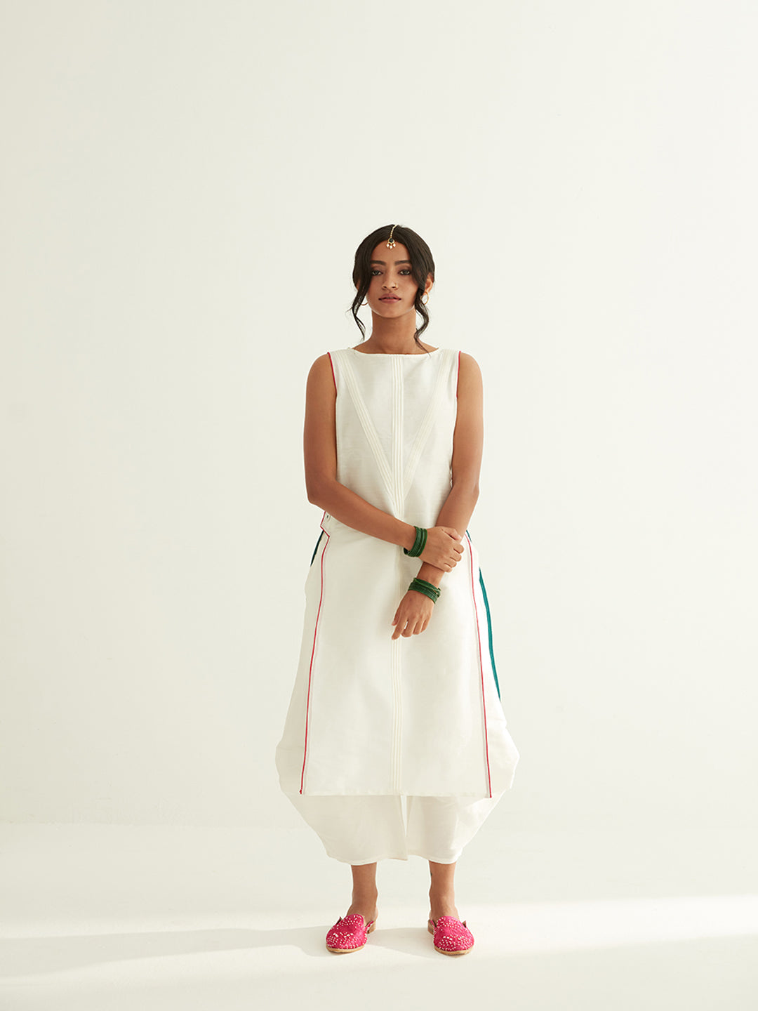 Straight banarasi pintuck kurta paired with pleated pants