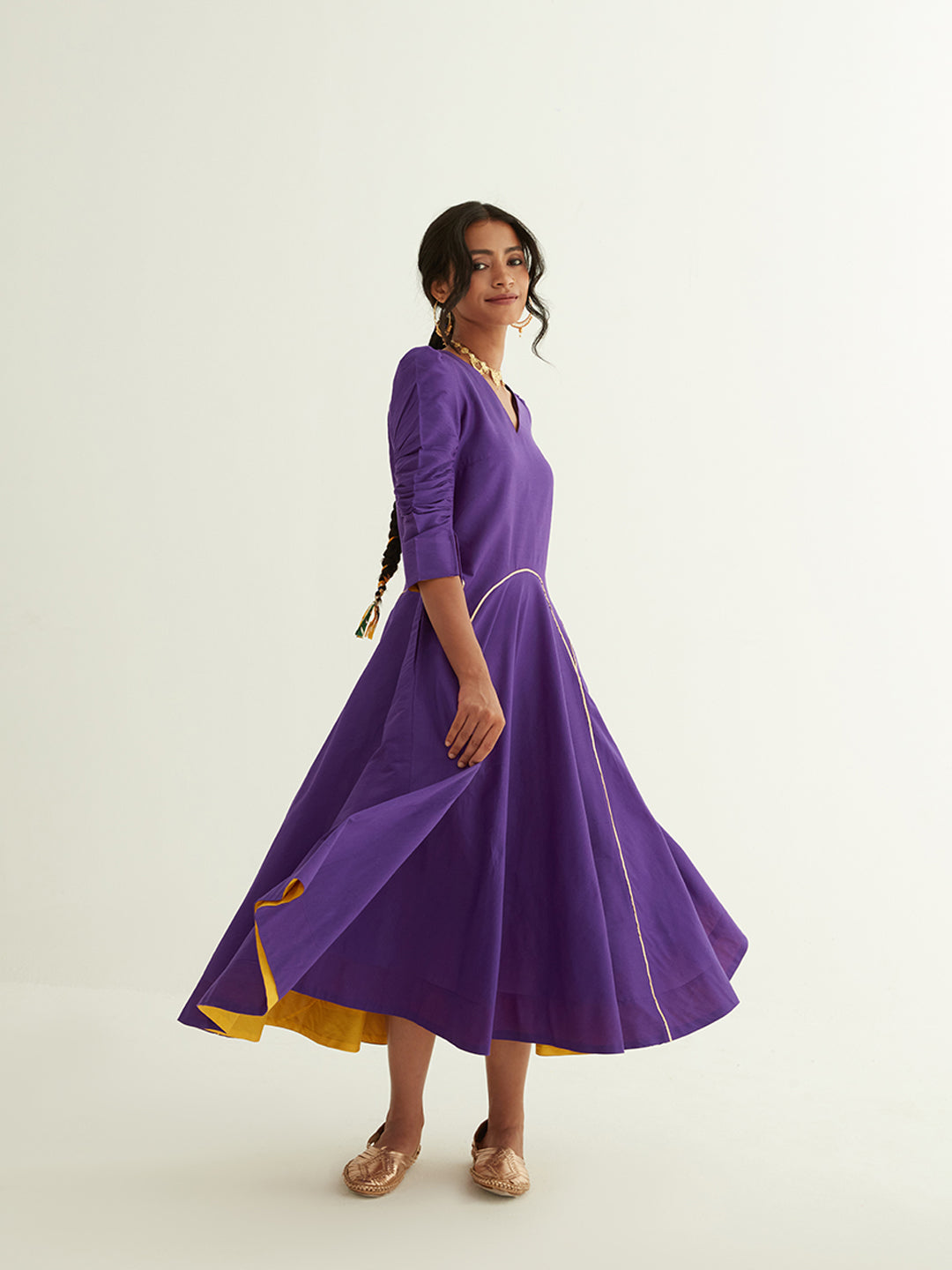 Circular panelled dress highlighted with Gota patti