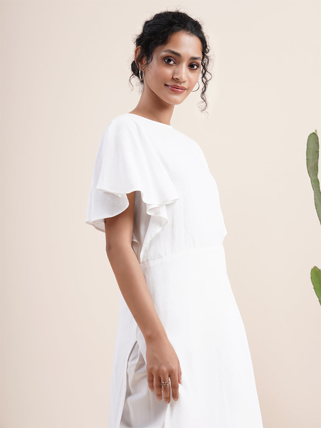 White Butterfly sleeved kurta paired with dhoti pants