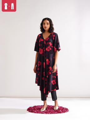 Asymmetrical Gulmohar kurta with cut out sleeves paired with pegged pants- Rich black