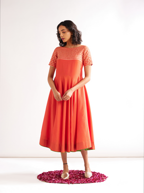 Circular panelled dress highlighted with Gota patti yoke- Spicy Orange