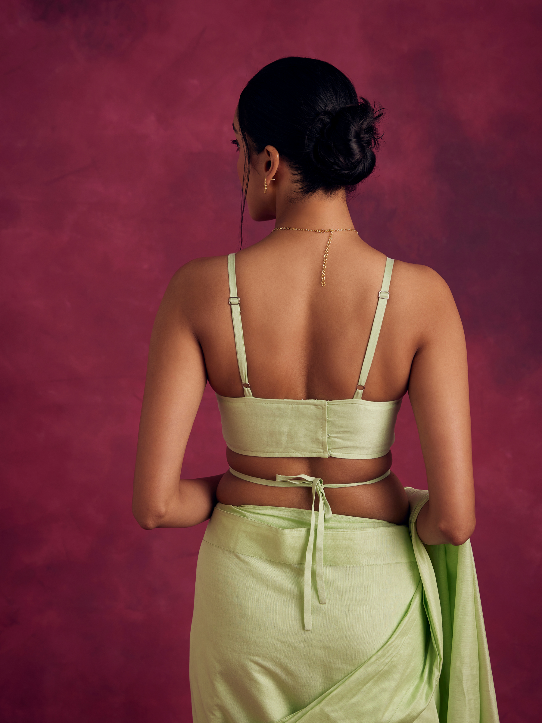 Demi- shaped blouse with 
criss cross tie up- Pistachio green
