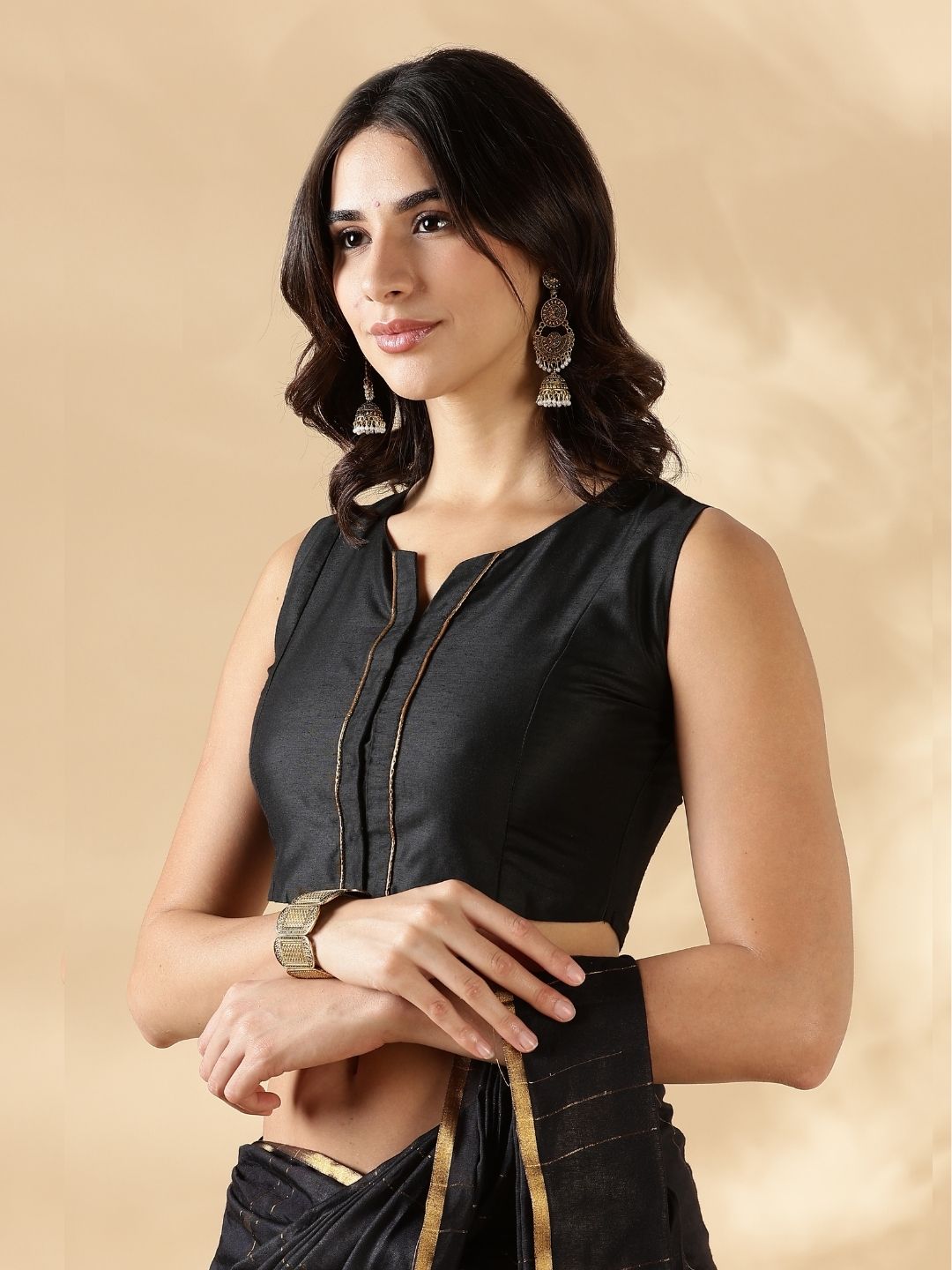 Sleeveless round neck front open blouse