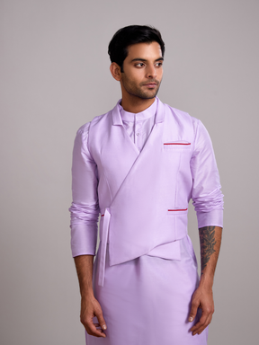 Gulmohar overlapped jacket with mandarin collar straight kurta paired with Straight pants- Lavender