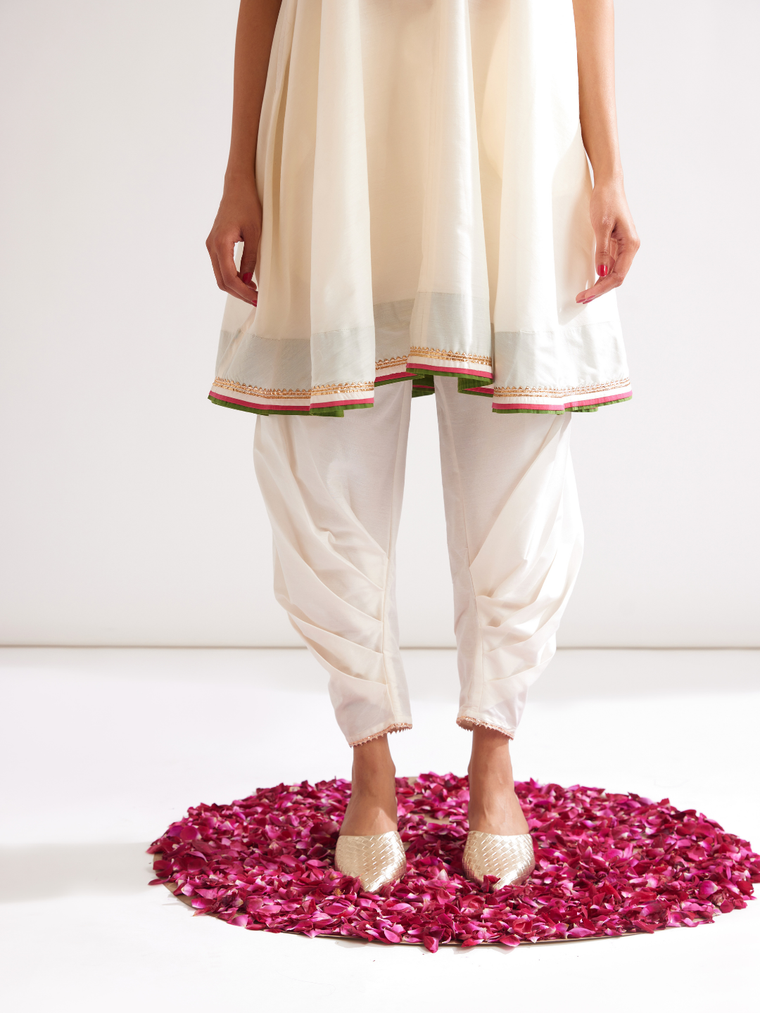 Back overlap halter neck kurta paired with side pleated pants along with dupatta- Ivory