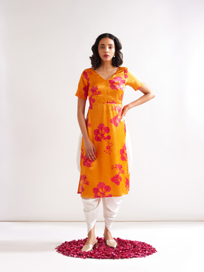 Gulmohar cowl drape straight kurta paired with dhoti pants along with dupatta- Spicy Orange