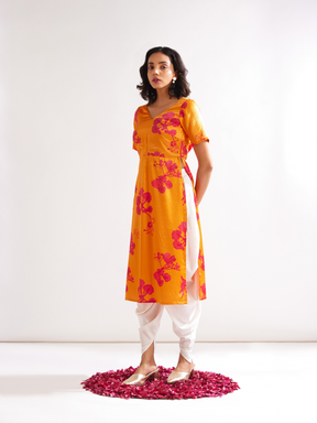 Gulmohar cowl drape straight kurta paired with dhoti pants along with dupatta- Spicy Orange