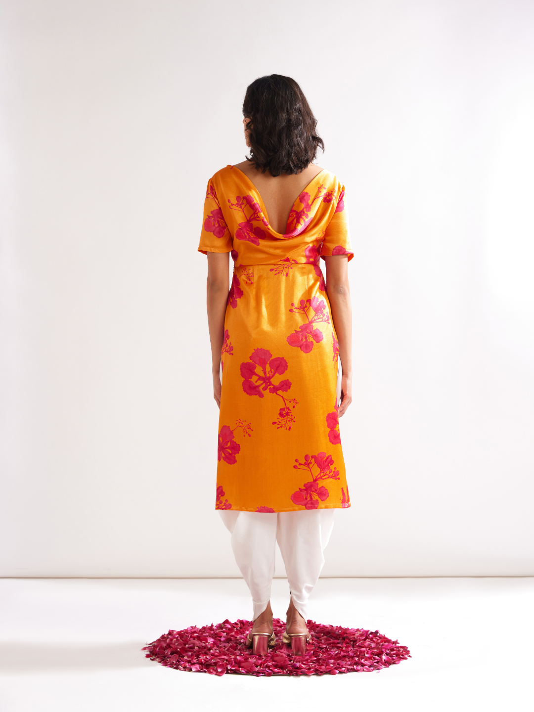 Gulmohar cowl drape straight kurta paired with dhoti pants along with dupatta- Spicy Orange