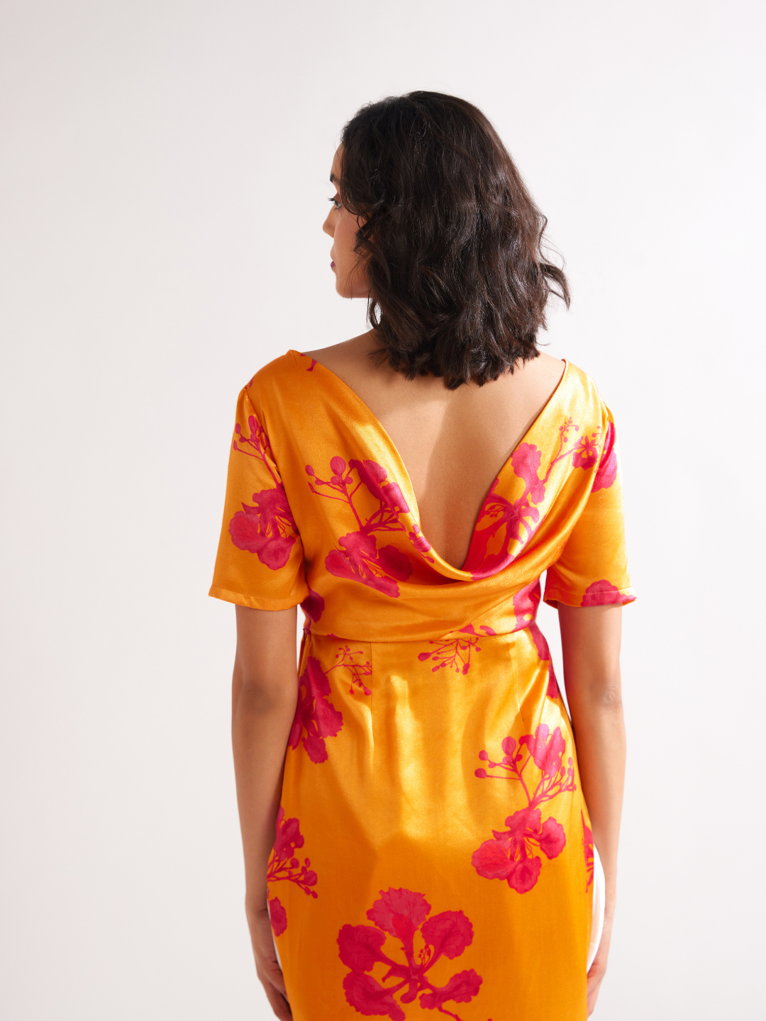 Gulmohar cowl drape straight kurta paired with dhoti pants along with dupatta- Spicy Orange