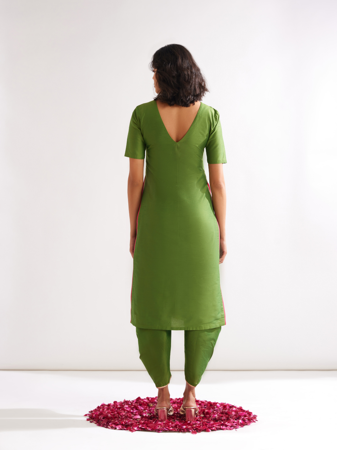 Shoulder cut-out kurta highlighted with gota patti yoke paired with side pleated pants along with dupatta- Pepper Green