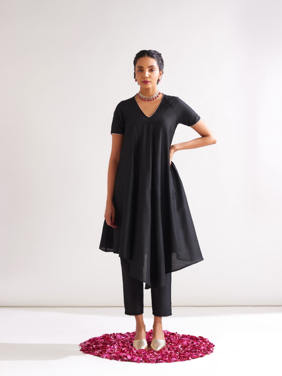 Gulmohar Petal kurta highlighted with gota patti paired with pegged pants along with dupatta- Rich black