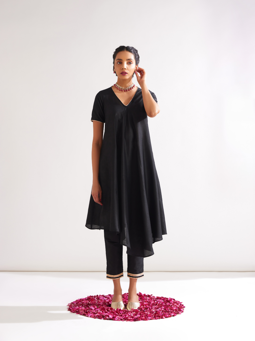 Gulmohar Petal kurta highlighted with gota patti paired with pegged pants along with dupatta- Rich black