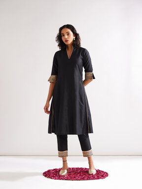 Stand collar straight kurta highlighted with gota patti with pegged pants along with dupatta- Rich black