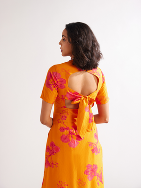 Gulmohar back tie-up kurta Paired with side pleated dhoti along with dupatta- Spicy Orange