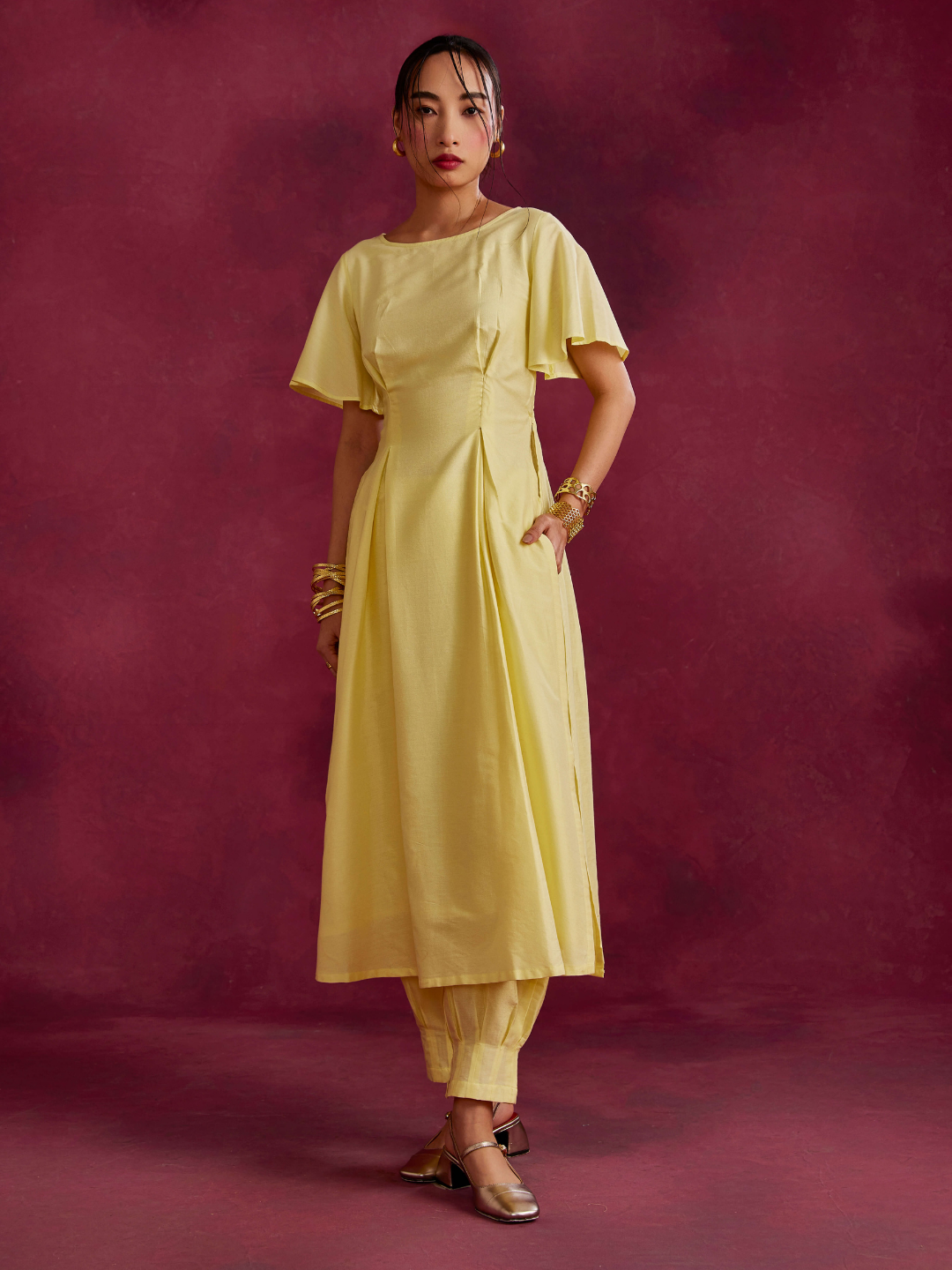 Pleated front kurta with back cut-out paired with pleated pathani pants- Lemon yellow