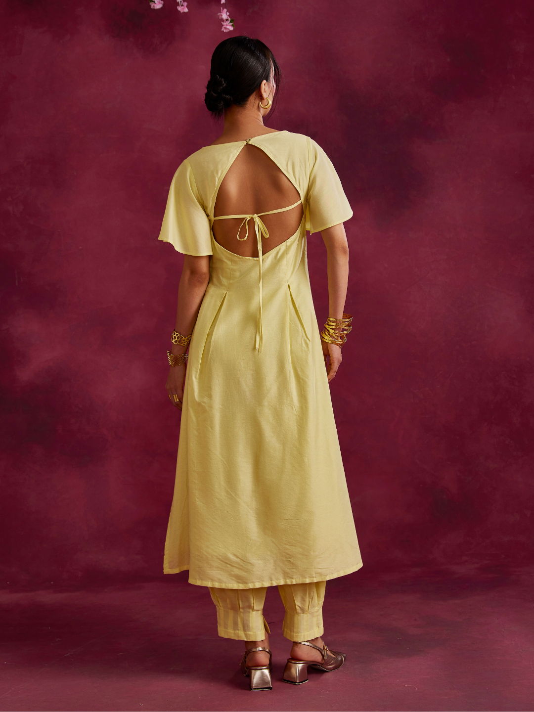 Pleated front kurta with back cut-out paired with pleated pathani pants- Lemon yellow