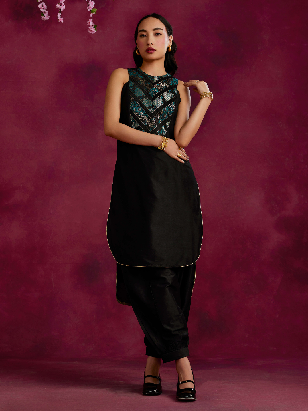 High-low hem kurta with pleated zari yoke paired with pathani pants- Black