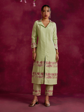 Lapel collared Kurta with zari border hem paired with pegged pants- Pistachio green