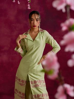 Lapel collared Kurta with zari border hem paired with pegged pants- Pistachio green