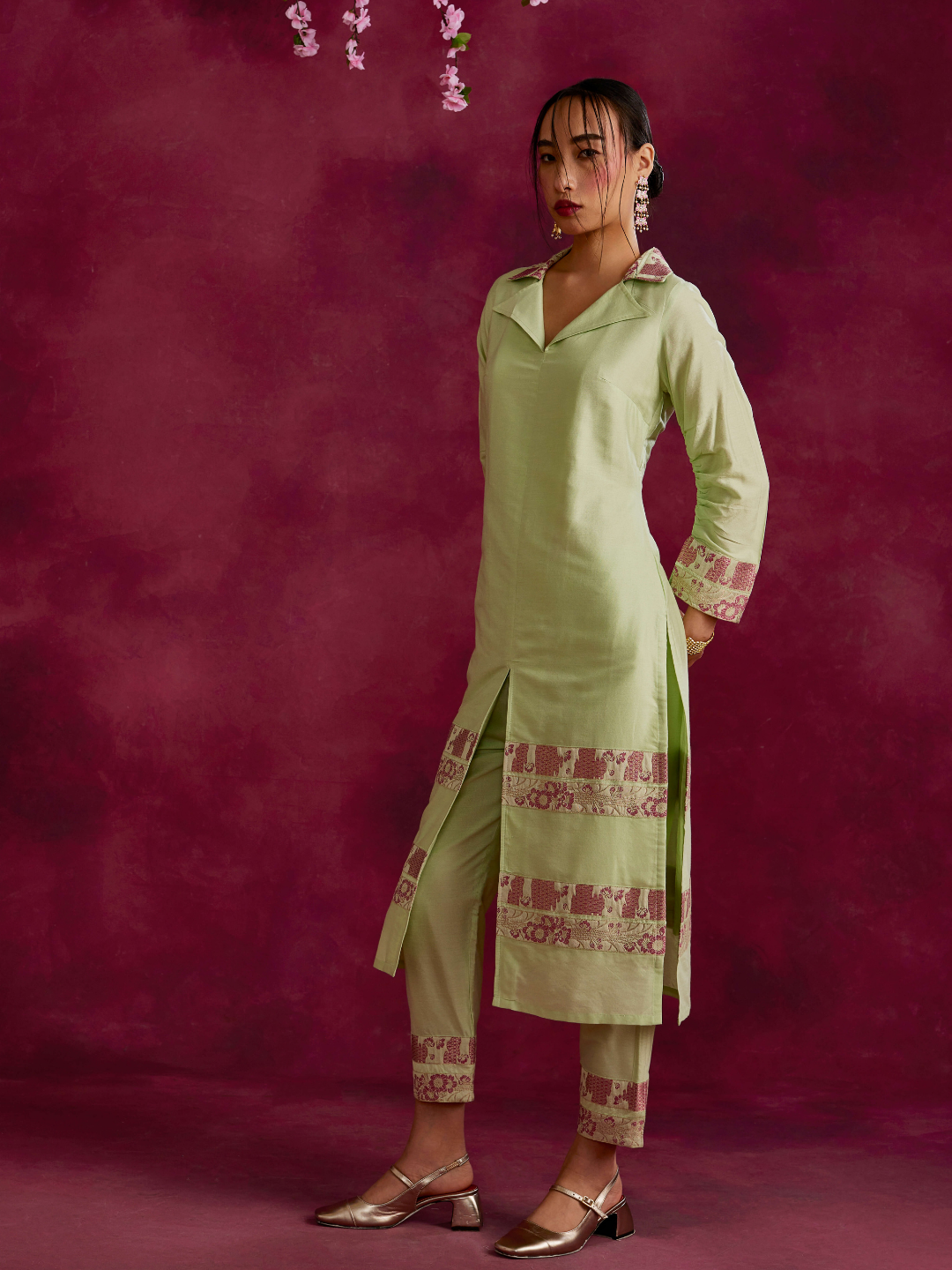 Lapel collared Kurta with zari border hem paired with pegged pants- Pistachio green