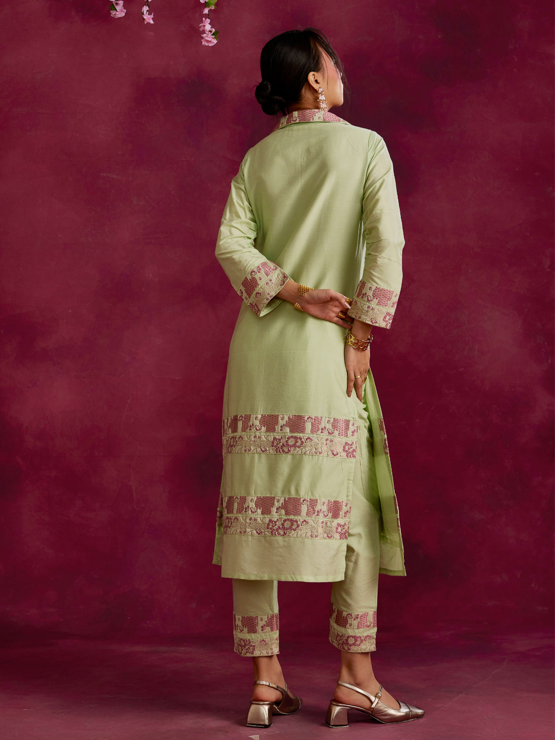 Lapel collared Kurta with zari border hem paired with pegged pants- Pistachio green