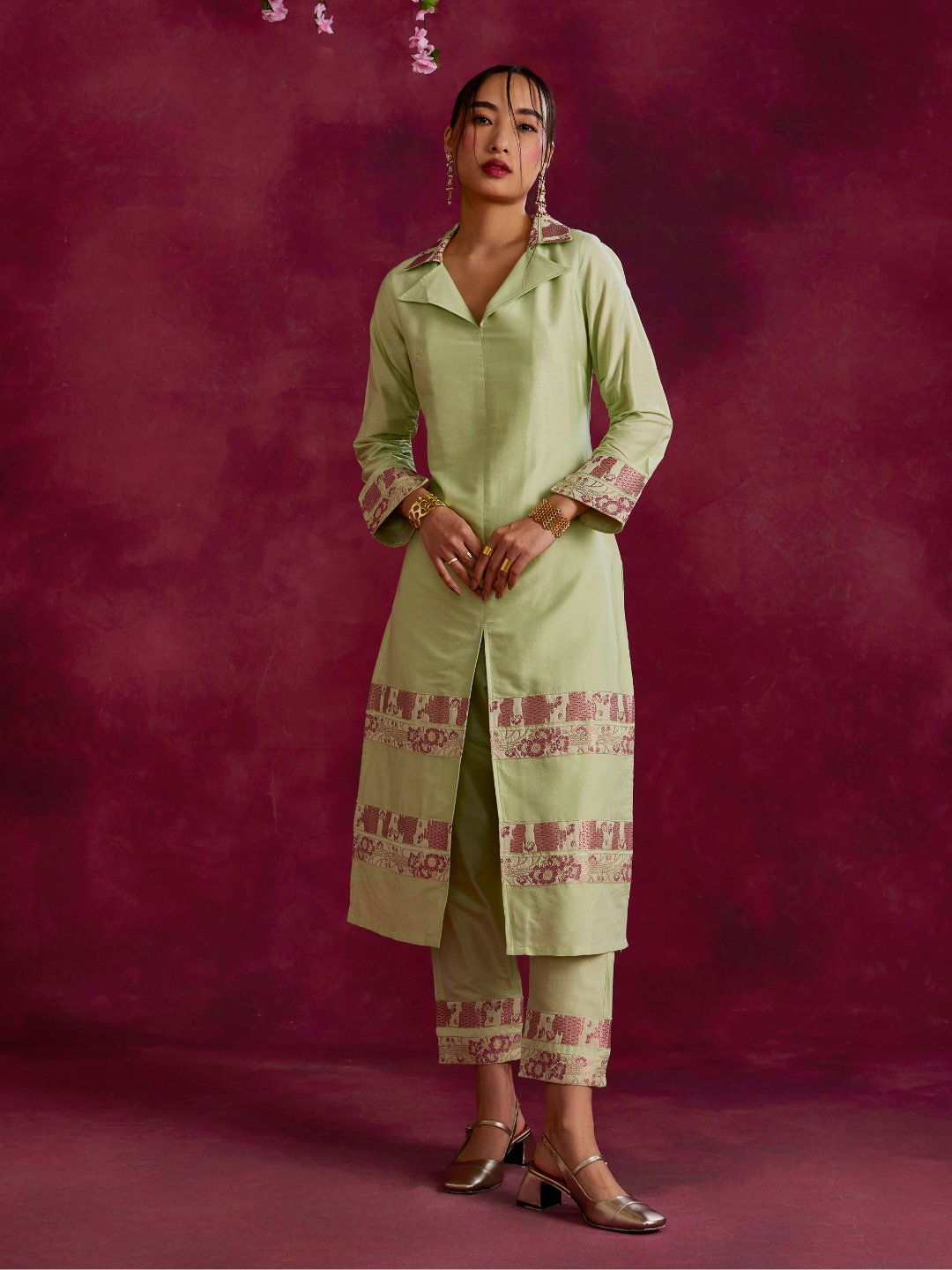 Lapel collared Kurta with zari border hem paired with pegged pants- Pistachio green
