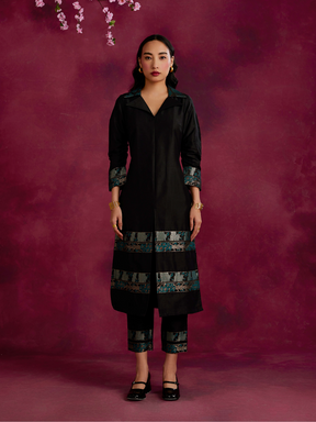 Lapel collared Kurta with zari border hem paired with pegged pants- Black