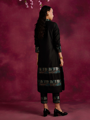 Lapel collared Kurta with zari border hem paired with pegged pants- Black