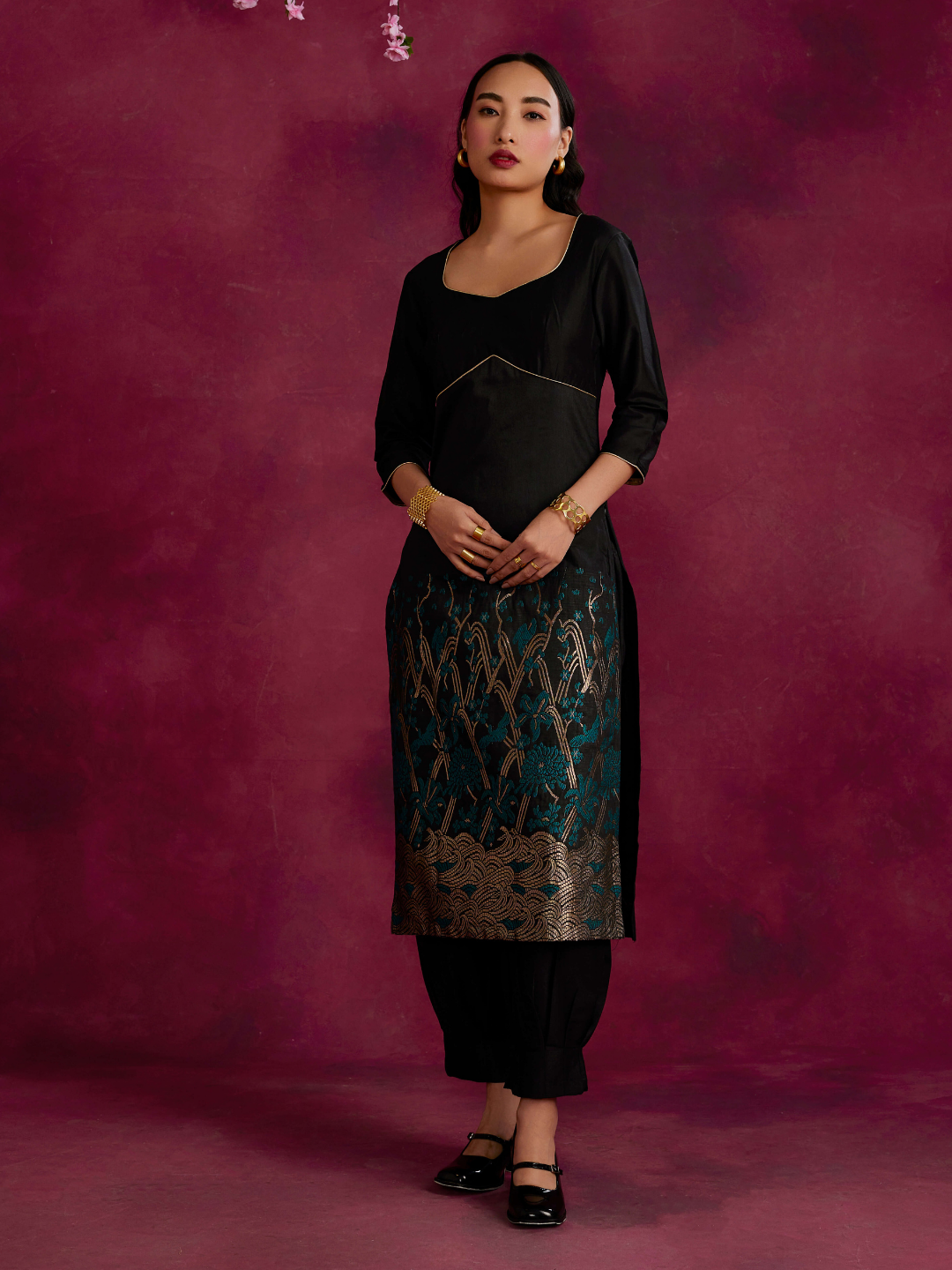 Adjustable back cut-out kurta with zari work hem paired with pathani pants- Black