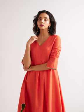 Inverted box pleat flare kurta paired with pegged pants- Spicy Orange