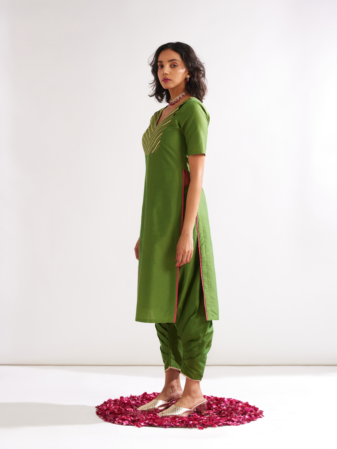 Shoulder cut-out kurta highlighted with gota patti yoke paired with side pleated pants- Pepper Green