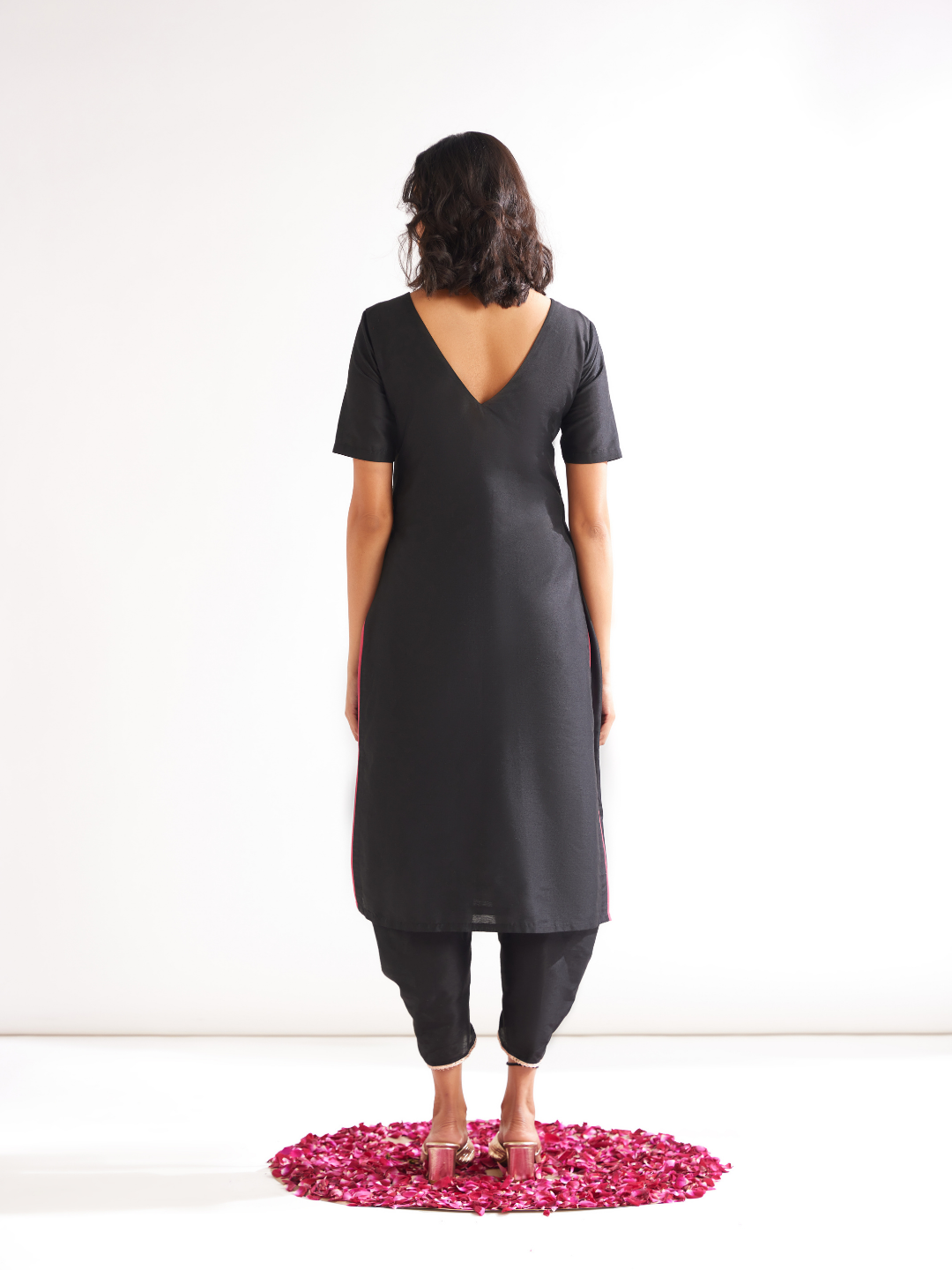 Shoulder cut-out kurta highlighted with gota patti yoke paired with side pleated pants- Rich black
