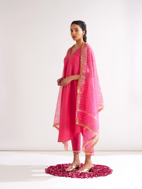 Gulmohar Petal kurta highlighted with gota patti paired with pegged pants- Raspberry