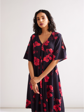 Asymmetrical Gulmohar kurta with cut out sleeves paired with pegged pants- Rich black