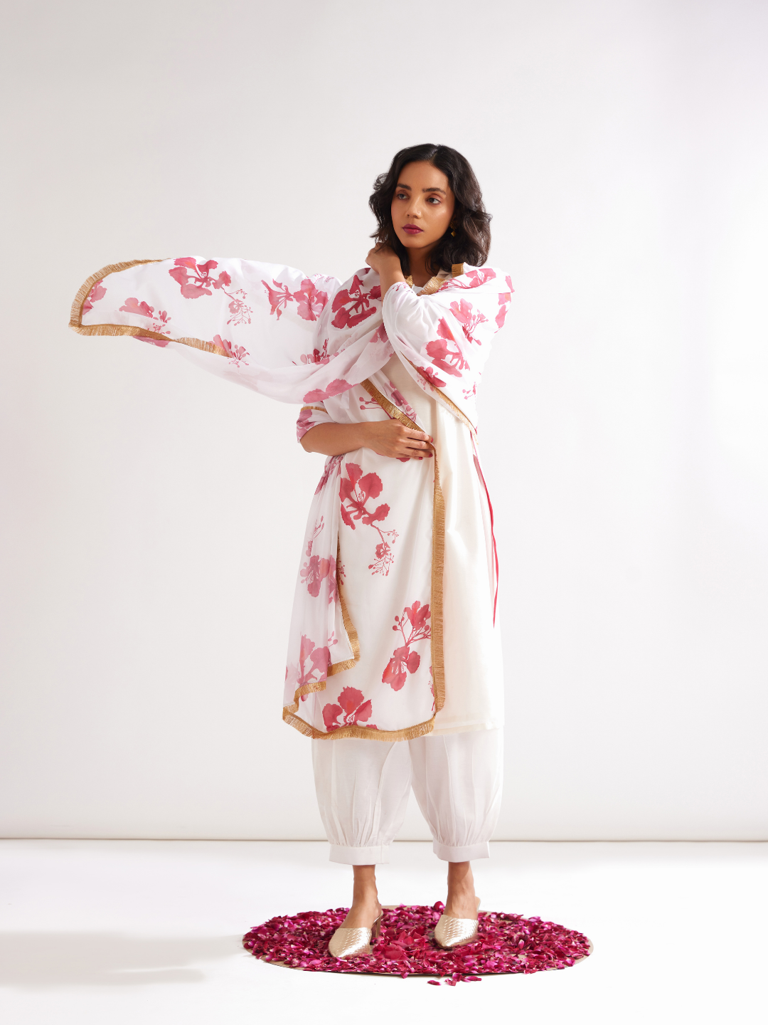 Gulmohar lapel collared straight kurta paired with pathani pants- Ivory