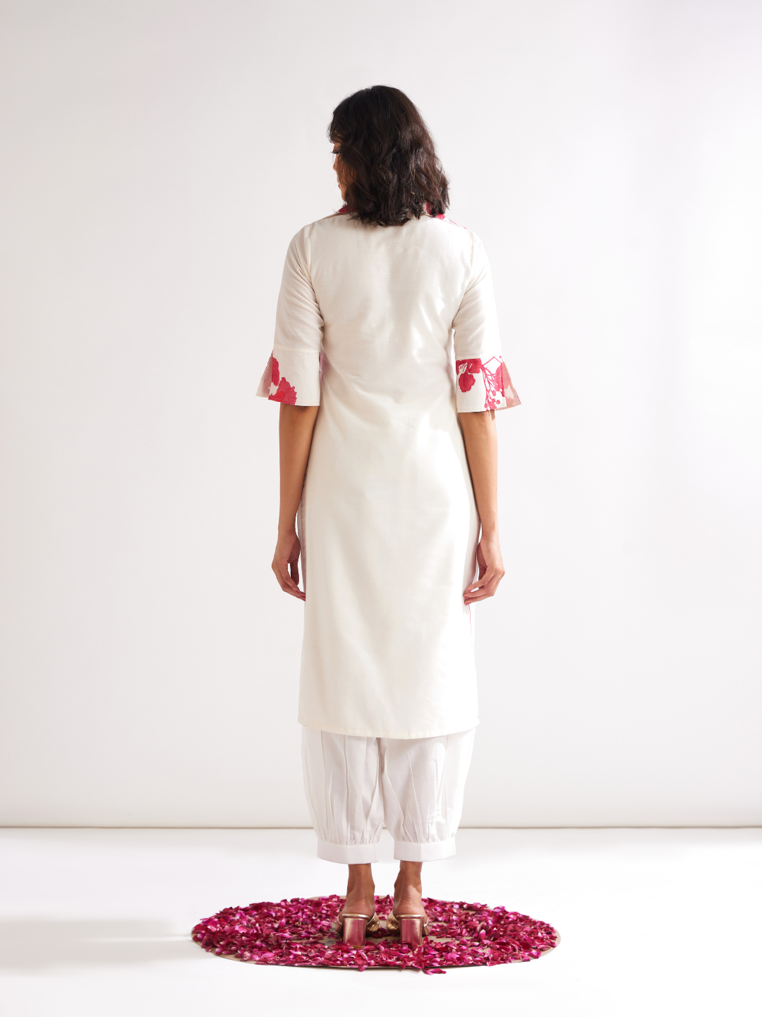 Gulmohar lapel collared straight kurta paired with pathani pants- Ivory