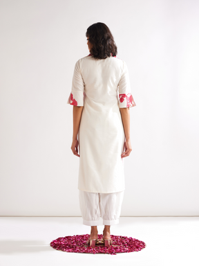 Gulmohar lapel collared straight kurta paired with pathani pants- Ivory