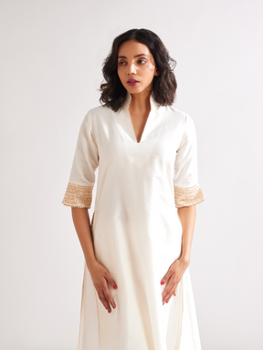 Stand collar straight kurta highlighted with gota patti with pegged pants- Ivory