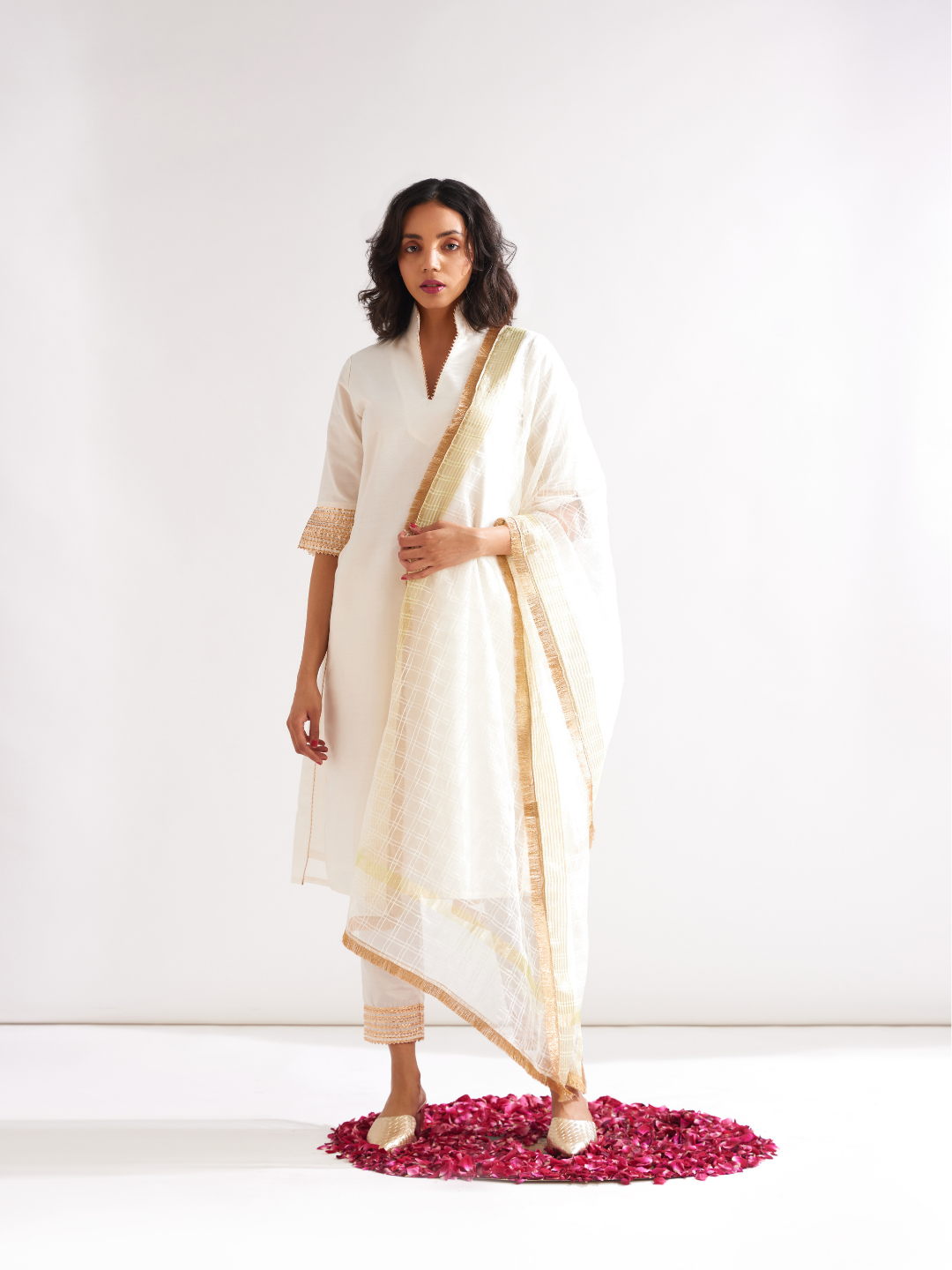 Stand collar straight kurta highlighted with gota patti with pegged pants- Ivory